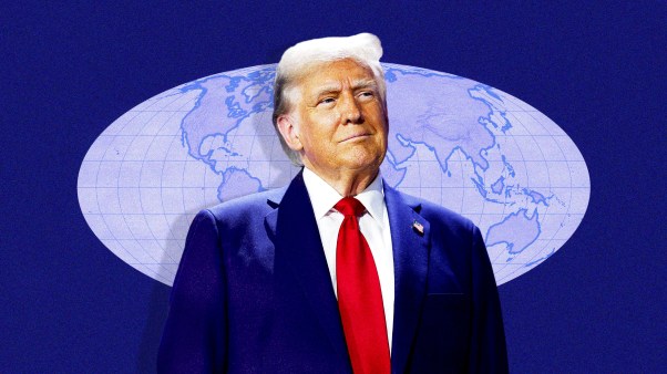 Donald Trump in front of a world map