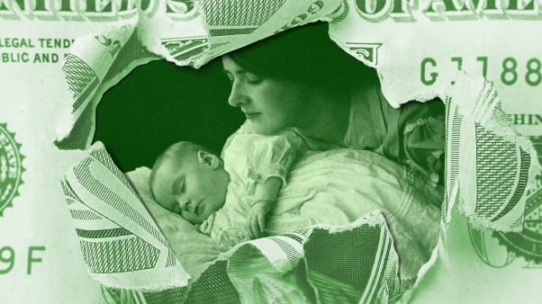 A torn dollar bill with an image of a mom and baby showing through.