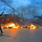 Barricades burn on the streets after the elections in Mozambique.