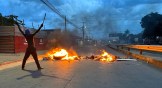 Barricades burn on the streets after the elections in Mozambique.