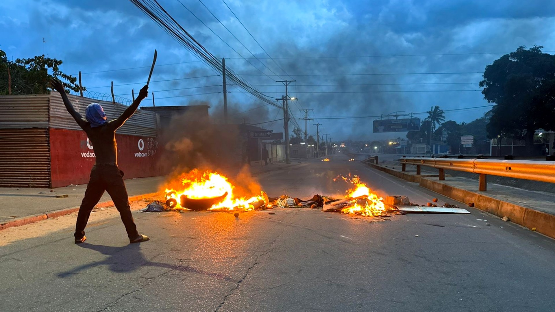 Barricades burn on the streets after the elections in Mozambique.