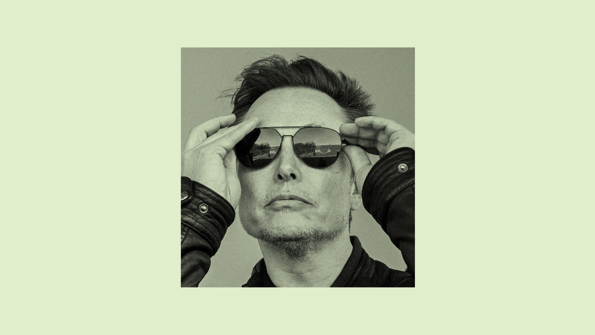 Elon Musk putting on sunglasses