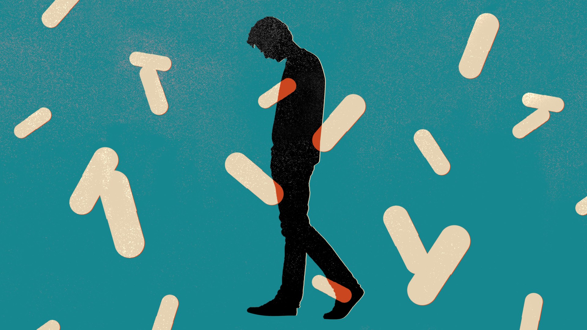 A sad man with pills all around him