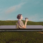 A woman coming out of a phone with binoculars in a landscape