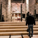 A man stands near the altar at the Roman Catholic Basilica of the Annunciation in Nazareth in northern Israel.
