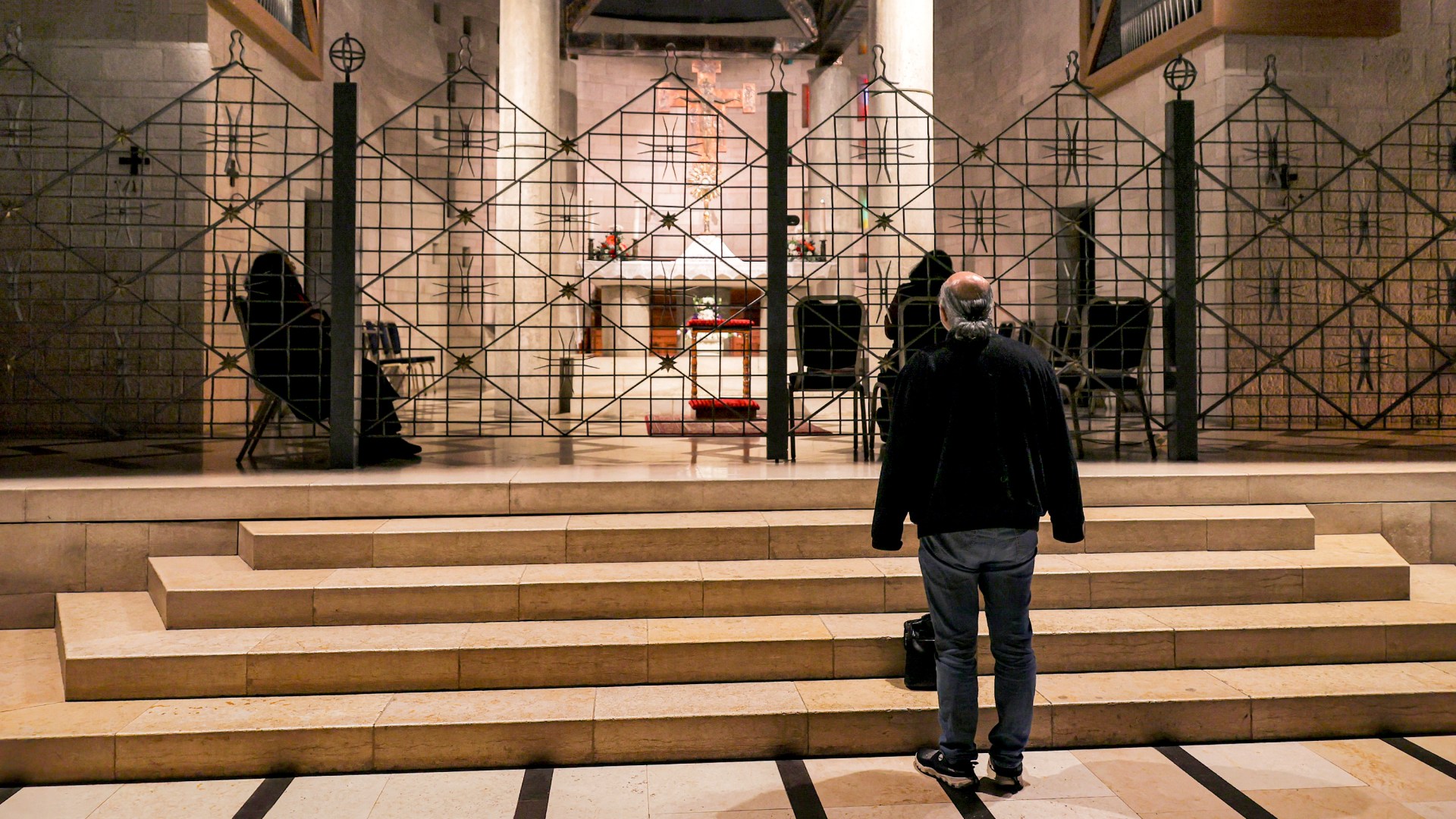 A man stands near the altar at the Roman Catholic Basilica of the Annunciation in Nazareth in northern Israel.