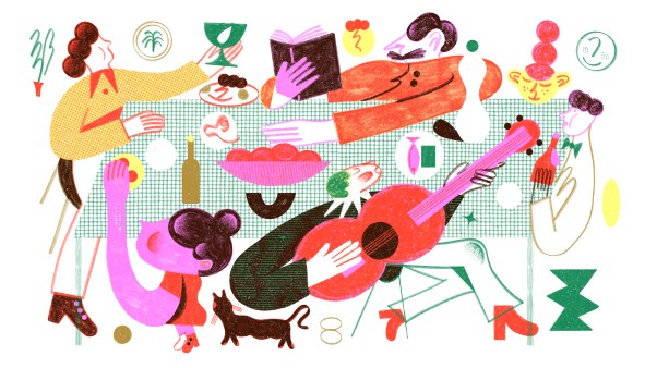 as pessoas se reuniram ao redor da mesa, comendo e comemorando